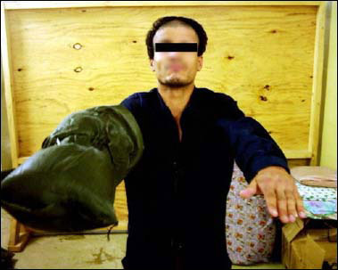 صور بشعة  لمعتقلين في سجن أبو غريب..  صورة رقم 7