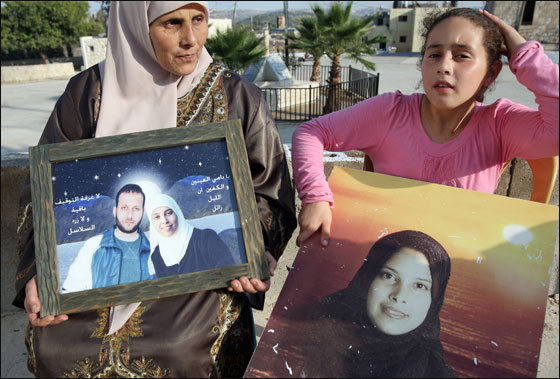 تسليم شاليط للاسرائيليين ومئات الأسرى في طريقهم للقاء الأهل صورة رقم 6