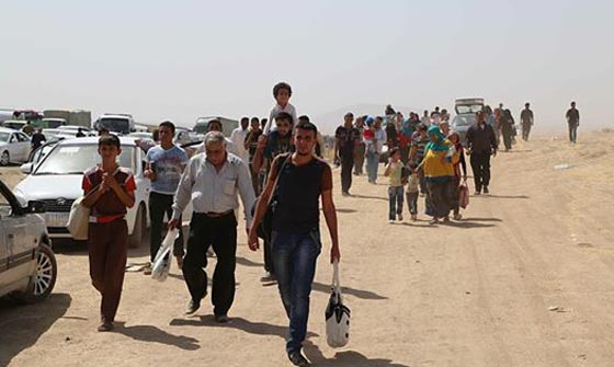 بغداد تفتح قلبها للمسيحيين الفارين من الموصل وتصف تهجيرهم بالعار! صورة رقم 6