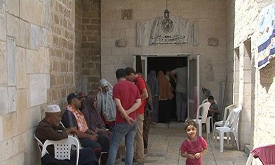 في غزة يرفع الآذان في الكنائس وفي الموصل ينزح المسيحيون! صورة رقم 4