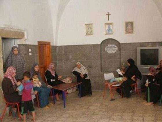 في غزة يرفع الآذان في الكنائس وفي الموصل ينزح المسيحيون! صورة رقم 7