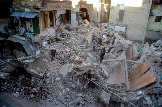 11 قتيلا في انهيار مبنى سكني من 8 طوابق في القاهرة صورة رقم 2