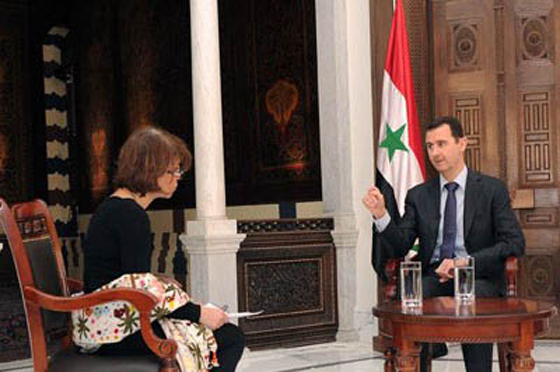 الاسد يتهم دول عربية بدعم الارهاب ومعارض سوري يتوعده بمصير القذافي  صورة رقم 3