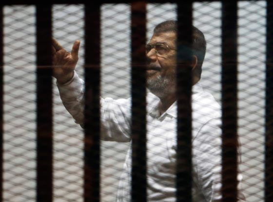 ما هي الكلمة التي اثارت مشادة بين مرسي ورئيس المحكمة؟ صورة رقم 1