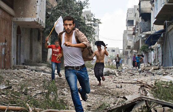 صور تحبس الانفاس بعدسة مصورة امريكية شجاعة في حرب غزة صورة رقم 4
