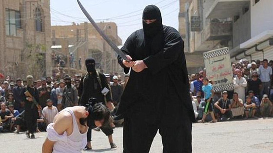 بلدوزر داعش.. عملاق يقطع والرؤوس ويحمل رشاشا يزن 52 كغم صورة رقم 2