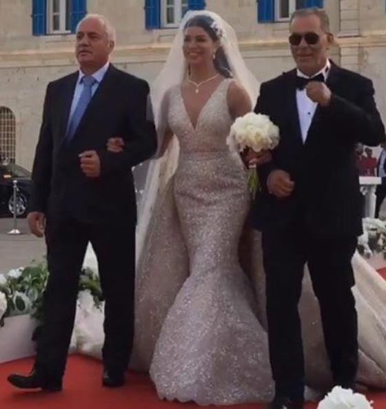 فيديو وصور زفاف ريما فقيه: ملكة جمال ترتدي فستانا يليق بها صورة رقم 2