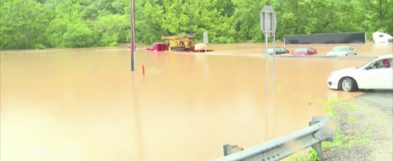 فيضانات فيرجينيا تودي بحياة 14 امريكيا من سكان الولاية صورة رقم 2