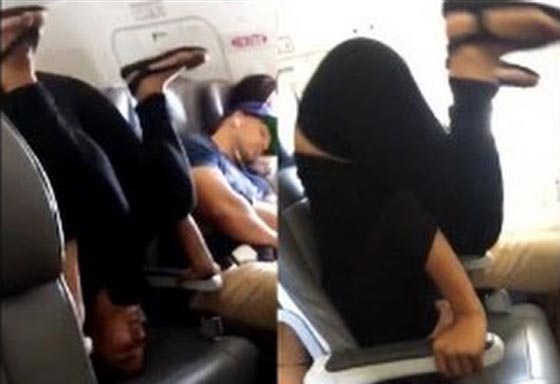 فيديو مثير..مسافرة غريبة الاطوار تقف على رأسها خلال رحلتها في الطائرة  صورة رقم 6