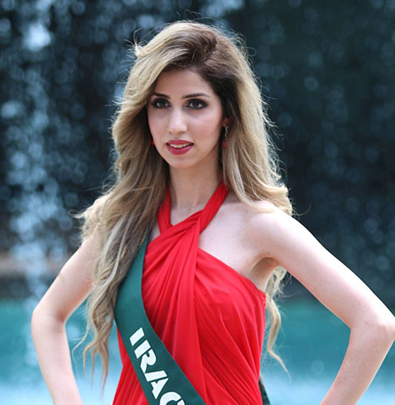 حسناء عراقية تظهر بفستان اثناء عرض البكيني في مسابقة للجمال صورة رقم 1
