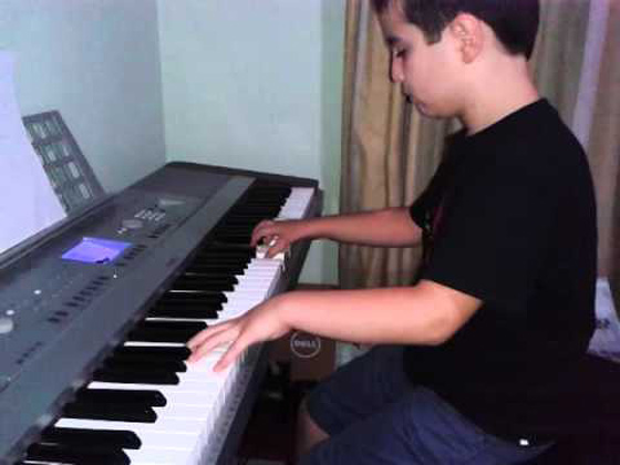 الطفل السوري نائل الطرابلسي معجزة أبهر الالمان بعزفه على البيانو صورة رقم 3