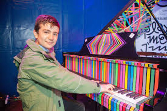 الطفل السوري نائل الطرابلسي معجزة أبهر الالمان بعزفه على البيانو صورة رقم 4