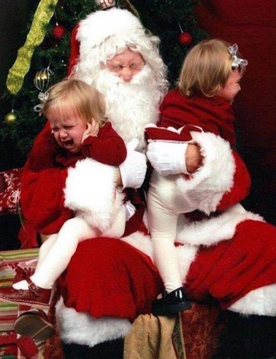 صور طريفة.. لحظات رعب تنتاب الاطفال في اول لقاء مع بابا نويل! صورة رقم 1