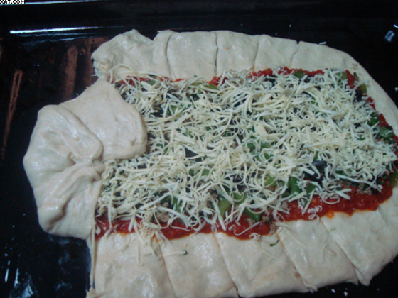 اليكم طريقة تحضير معجنات البيتزا الشهية صورة رقم 3