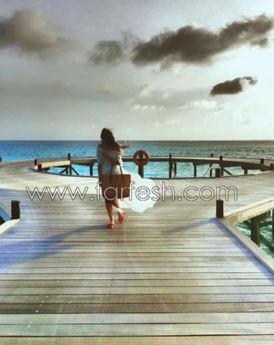 صور تامر حسني مع زوجته بسمة بوسيل على شواطئ المالديف صورة رقم 2