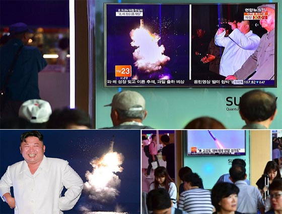صور زعيم كوريا الشمالية يرقص طربا بعد اطلاق صاروخ بالستي صورة رقم 3