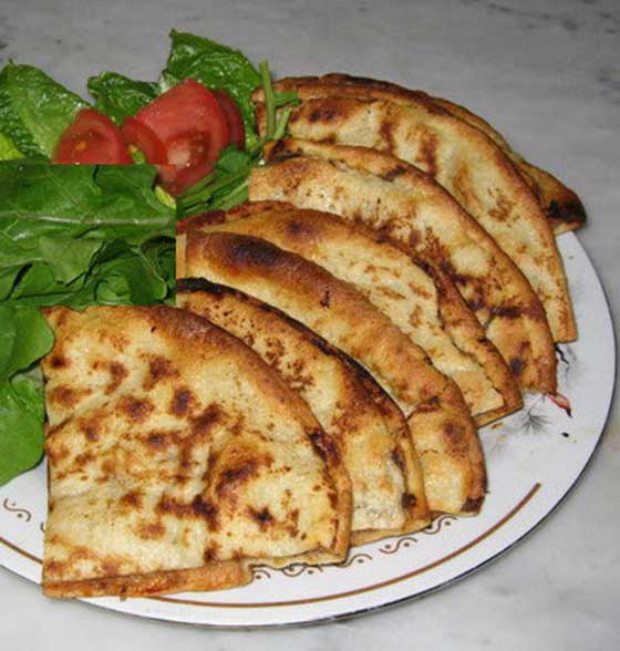 اليك طريقة تحضير العرايس باللحم والخبز العربي لعشاء مميز صورة رقم 4