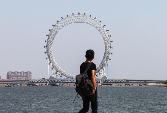 الصين تفتتح دولاب الهواء السياحي الضخم مزود بتلفاز وشبكة واي فاي صورة رقم 7