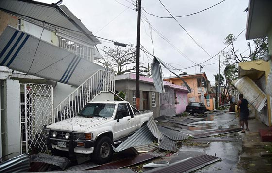 الإعصار ماريا يجتاح بورتوريكو والكاريبي فدمر المباني وقطع الكهرباء والجزيرة تستنجد! صورة رقم 7