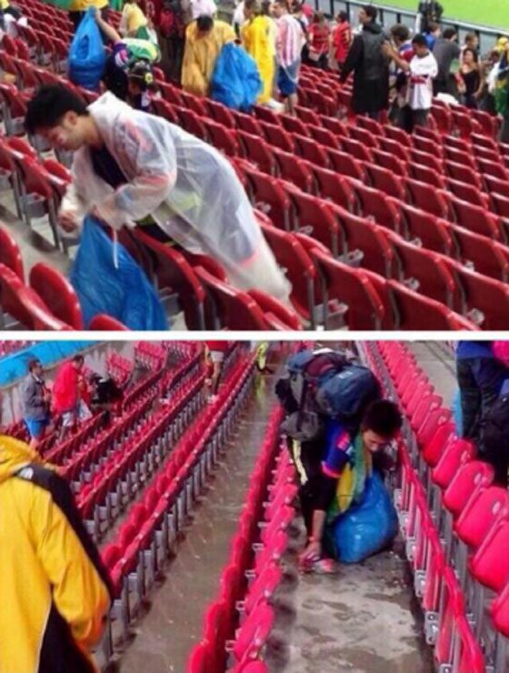 فيديو وصور:  ما اروع مشجعي منتخب اليابان، نظفوا المدرجات من النفايات صورة رقم 1