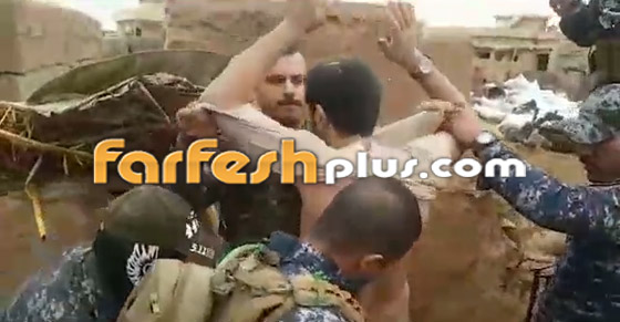 بالفيديو: الشرطة العراقية تعثر على قيادي ارهابي داعشي مختبئ تحت الأرض صورة رقم 7
