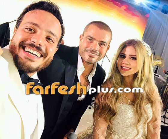  فيديو وصور عمرو دياب يرقص مع عروسين فازا بمسابقة (فرحنا بالهضبة) صورة رقم 1