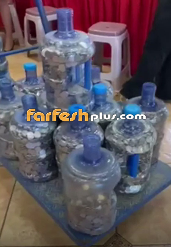 بائع متجول صيني يشتري شقة بـ20 زجاجة مياه مملوءة بالعملات المعدنية! صورة رقم 3
