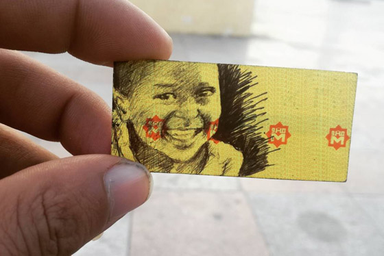 صور: رسام مصري يحوّل تذاكر المترو إلى لوحات فنية مذهلة صورة رقم 11