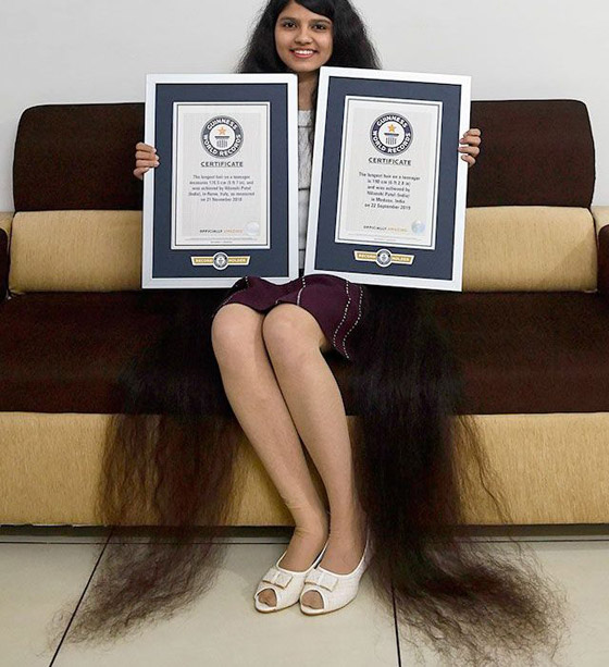 شاهدوا .. صاحبة أطول شعر في العالم تحافظ على لقبها في موسوعة غينيس صورة رقم 1