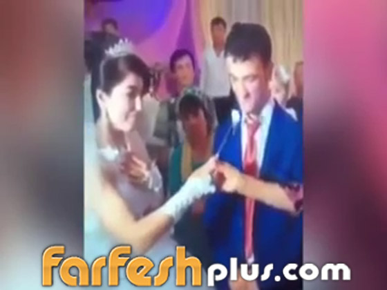 5 فيديوهات صادمة: حين تداعب العروس عريسها في حفل الزفاف فيصفعها! صورة رقم 5
