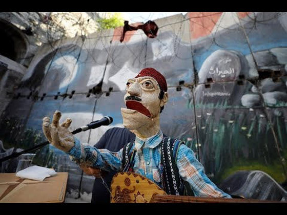 فلسطيني يغني ببطنه في الضفة للحفاظ على التراث صورة رقم 2