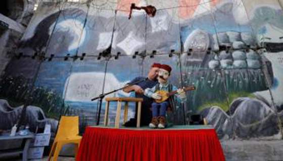 فلسطيني يغني ببطنه في الضفة للحفاظ على التراث صورة رقم 6