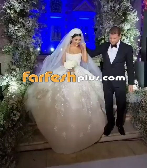 صور وفيديو - إطلالة ملكية للإعلامية اللبنانية جيسيكا عازار بالفستان الأبيض في حفل زفافها صورة رقم 1
