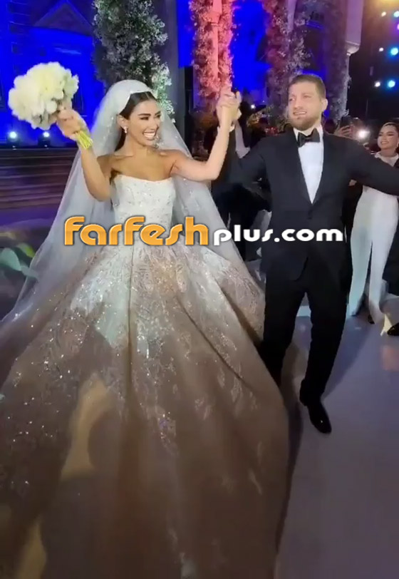 صور وفيديو - إطلالة ملكية للإعلامية اللبنانية جيسيكا عازار بالفستان الأبيض في حفل زفافها صورة رقم 2