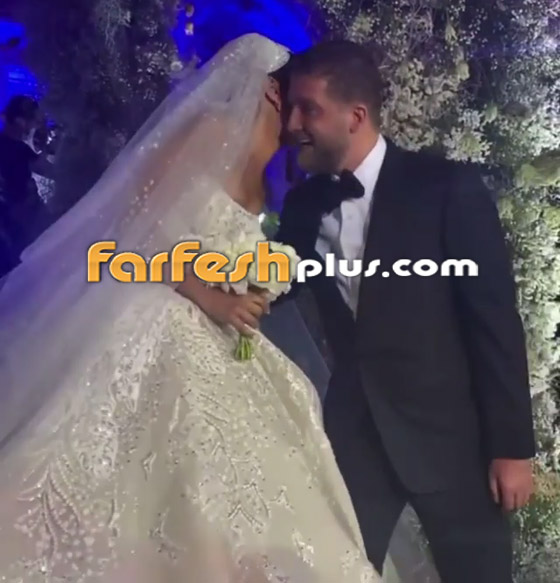 صور وفيديو - إطلالة ملكية للإعلامية اللبنانية جيسيكا عازار بالفستان الأبيض في حفل زفافها صورة رقم 6