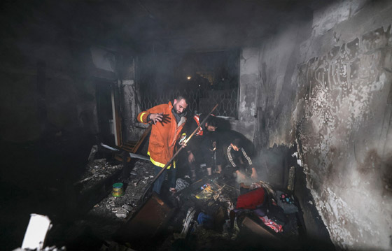  صورة رقم 4 - مصرع 21 شخصا من عائلة واحدة في حريق مروع بمبنى سكني في غزة