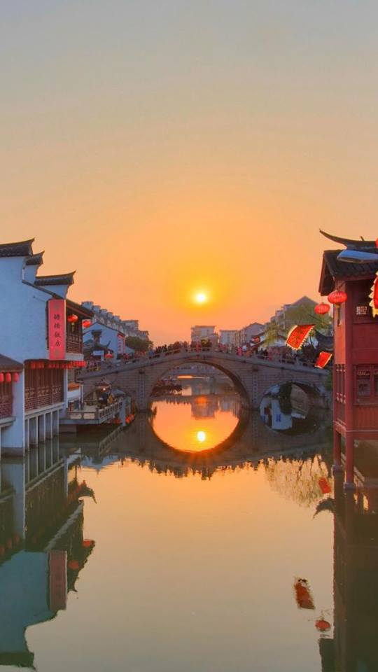 غروب الشمس في تشى باو، الصين