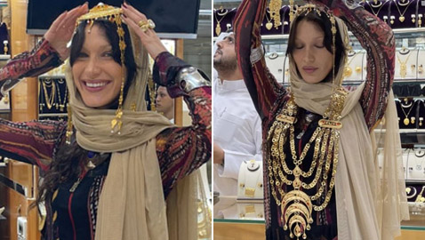 قطر: بيلا حديد تبالغ بالتزين بالذهب وتعلق دبوس يحمل صورة الفلسطينية شيرين عاقلة